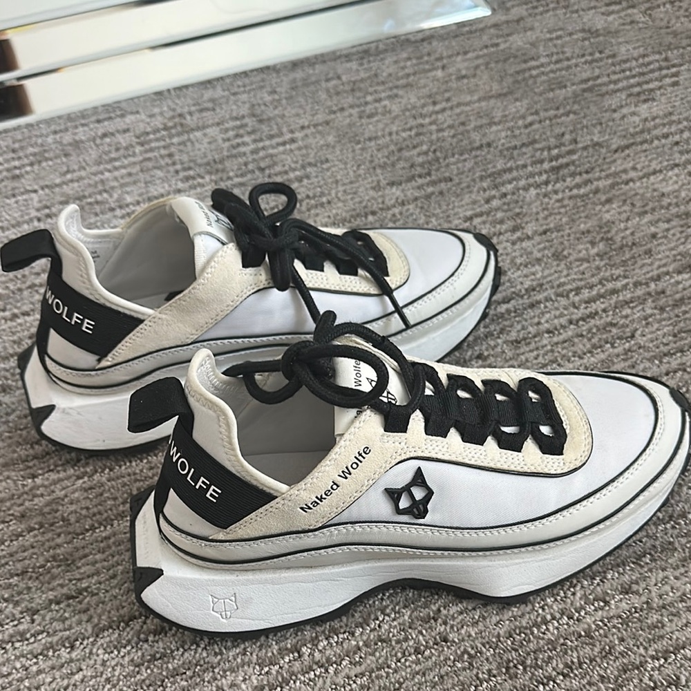White and Black Sneakers by Naked Wolfe
